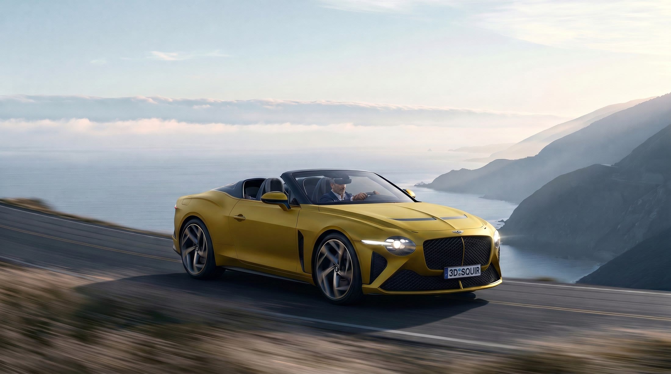 Yellow convertible on a coastal road