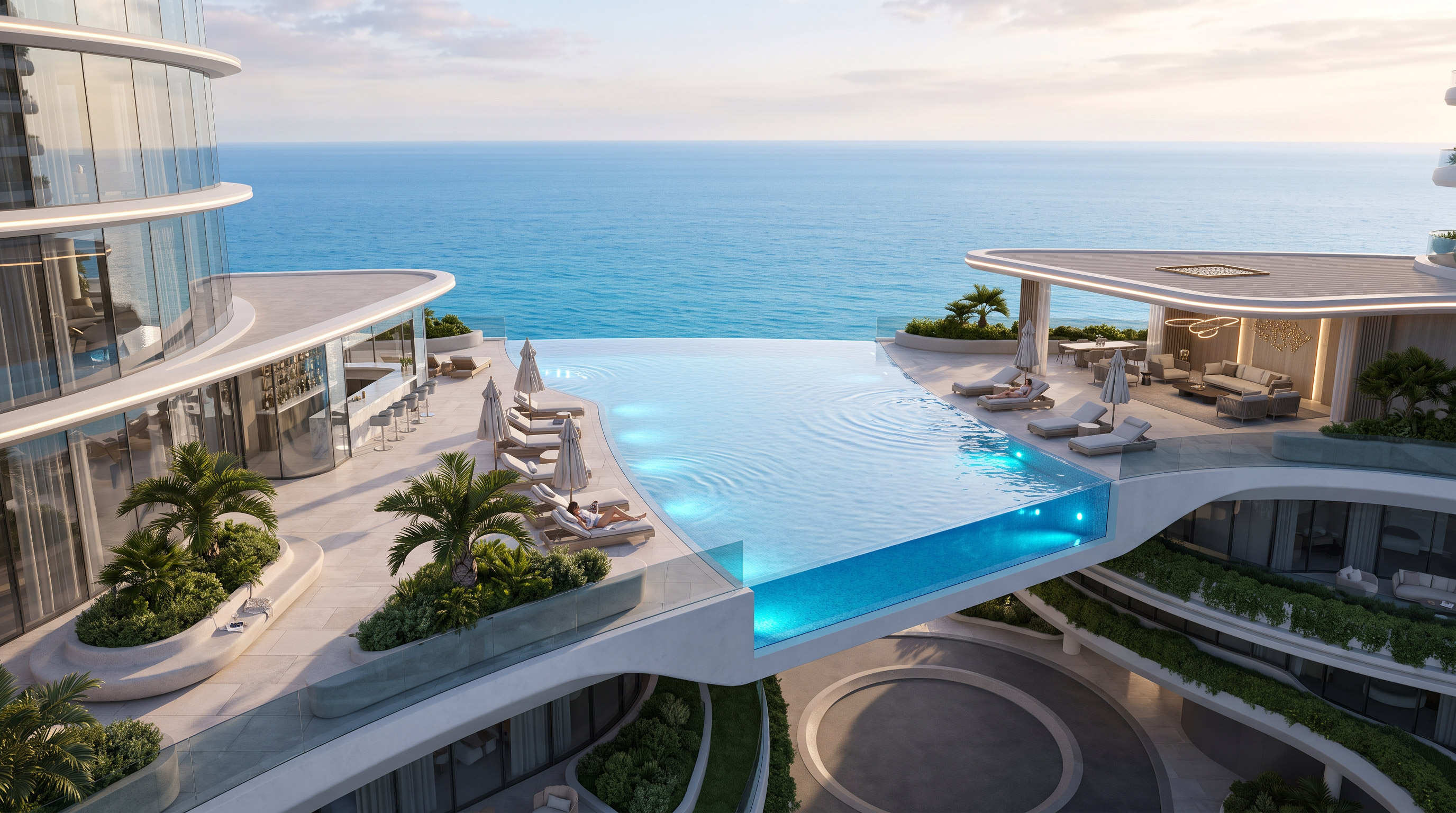 Glass-edged infinity pool on a curved podium terrace above the sea